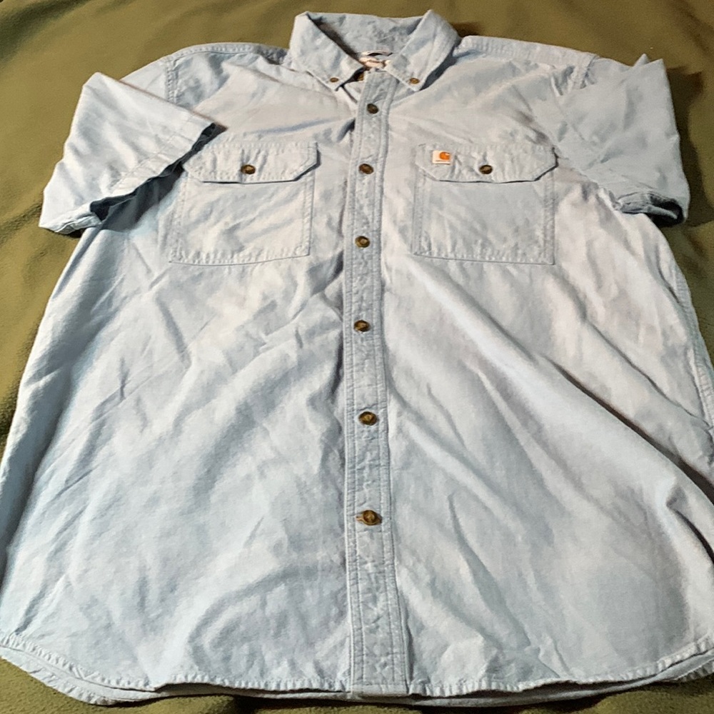 Men’s Carhartt blue, short sleeve, button up shirt.  Pockets on chest.  Size L
